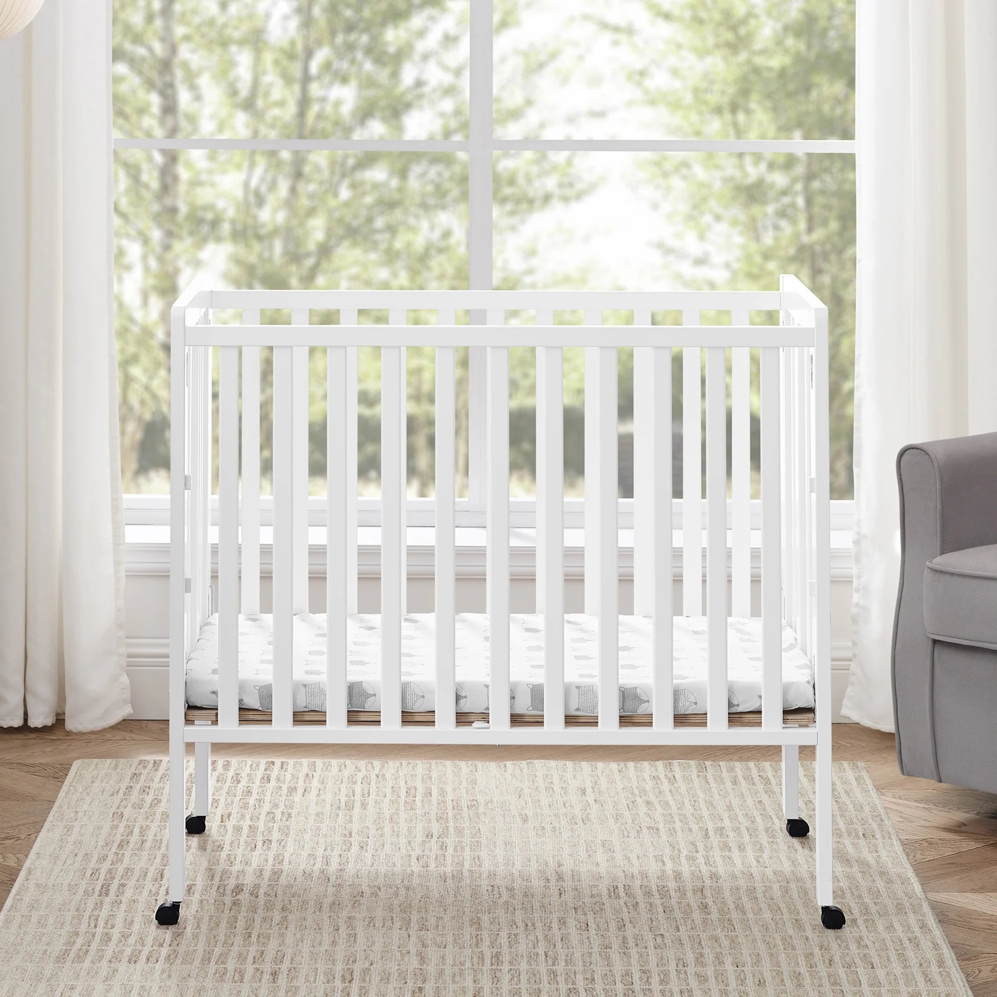 Delta Children Lee Portable Folding Mini Crib with 1.5 - Inch Mattress - Greenguard Gold Certified, Bianca White