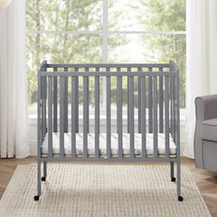 Delta Children Lee Portable Folding Mini Crib with 1.5 - Inch Mattress - Greenguard Gold Certified, Bianca White